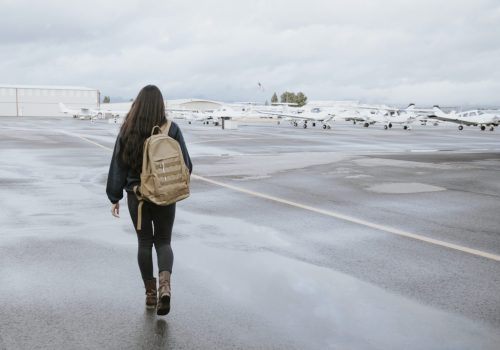 Pilot walking to her plane